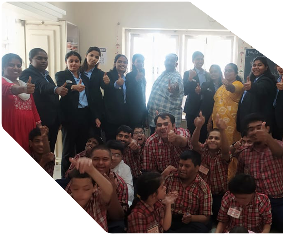 Helping Hand students and educators connecting with students from Avinash College of Commerce