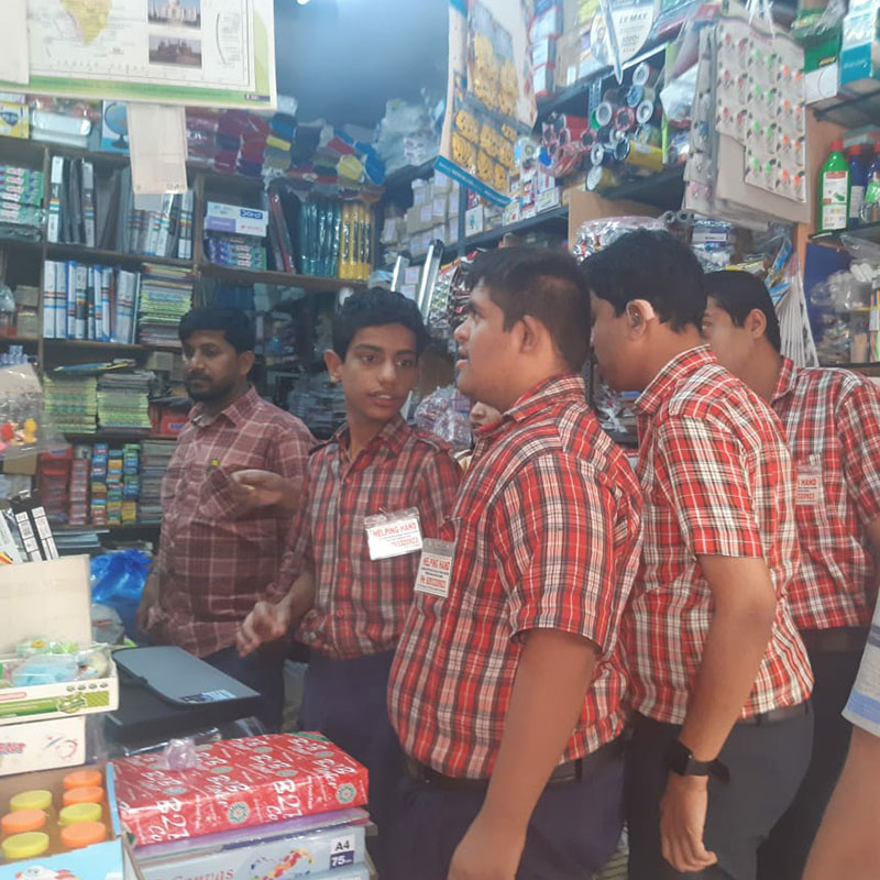 Students exploring a stationary shop